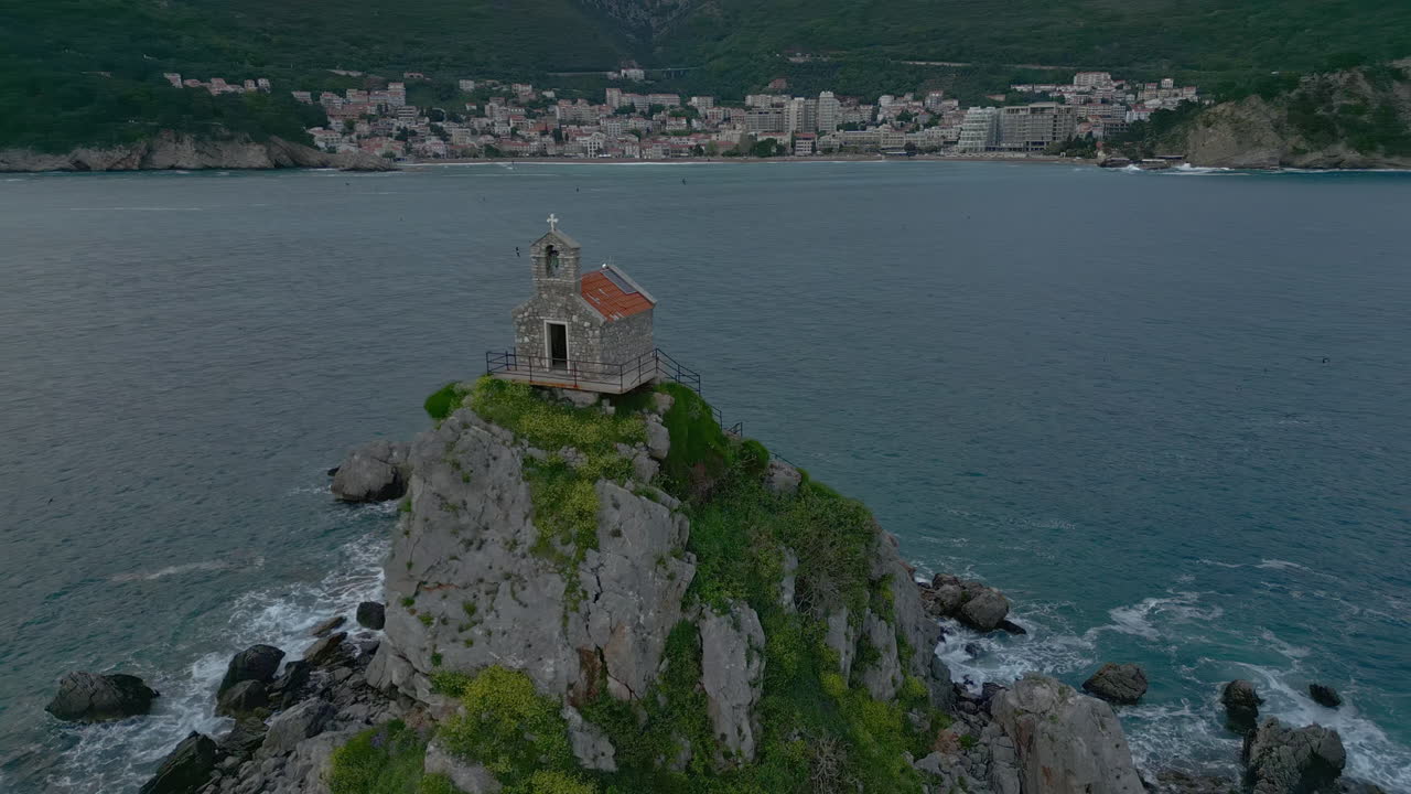 Church on a Rocky Island in the Sea