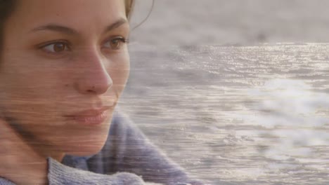 Woman-sitting-at-the-beach