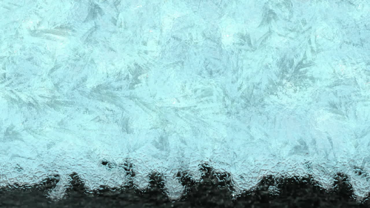 검은 바탕에 물방울 위에 얼음의 애니메이션