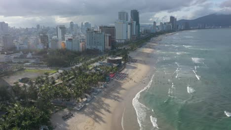 Aerial-view-of-long-white-sand-stretch-My-Khe,-My-Bac-An-and-Non-Nuoc-beach-in-Danang,-Central-Vietnam