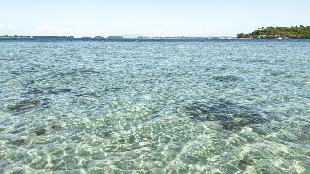 Drone Flying Above Lagoon and Coral Reefs of Bora Bora Island, French Polynesia