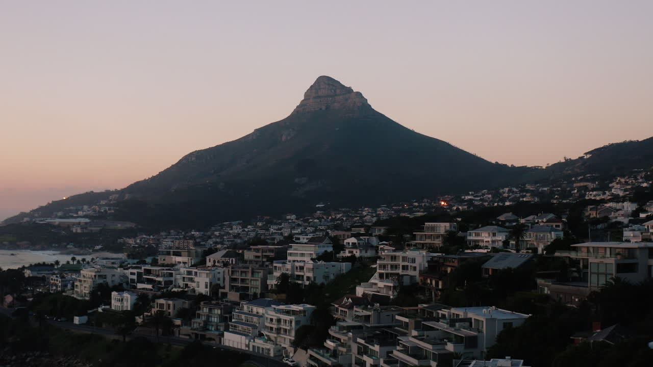 Sunset Drone Shot from Camps Bay of Lions Head in Cape Town, South Africa