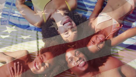 animación de la bandera de los estados unidos sobre una pareja afroamericana con un hijo y una hija en la playa