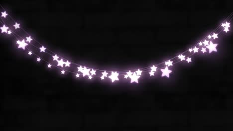 Animation-of-purple-star-shaped-glowing-fairy-lights-hanging-against-copy-space-on-black-background