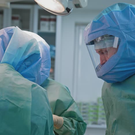 operating room with surgery in progress. medical team performing surgical operation in bright modern operating room