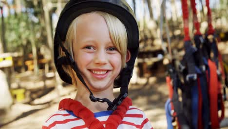 kid smiling in the forest 4k