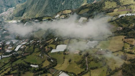 aerial drone view of baños de agua santa with andes highlands near tungurahua volcano in ecuador