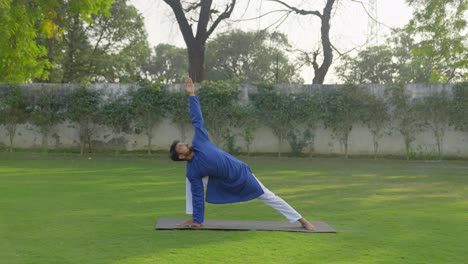 indian young adult man doing yoga