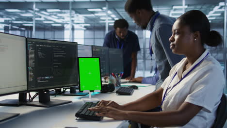 diverse tech team working in a modern office