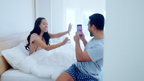 couple, smile and photography on phone in bedroom