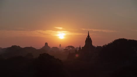 sunrise over bagan temples with hot air balloons