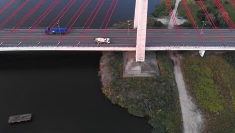 aerial shot of cable-stayed bridge on motława river in gdansk, poland