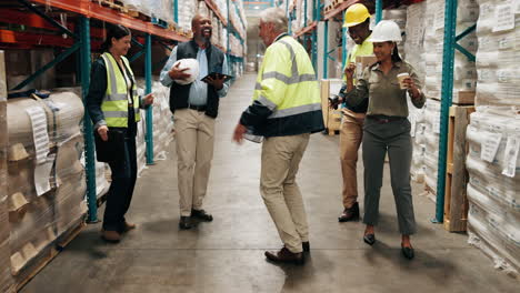 warehouse workers celebrating success