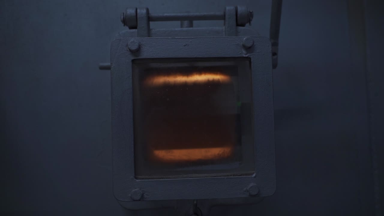 Inside view of an active waste incinerator with fire