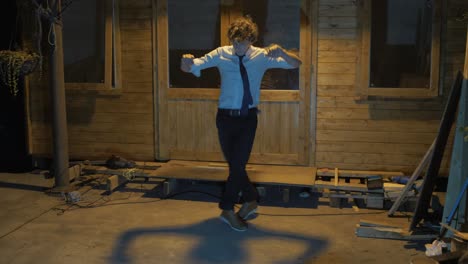 young man dancing outdoors swing dance moves