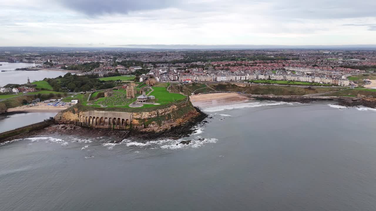 Aerial drone view tynemouth beach seaside north east england uk town british beach city tyne and wear Priory and Castle North Tyneside