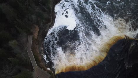 Tahquamenon-Falls-in-Michigan-with-overhead-drone-shot-moving-up