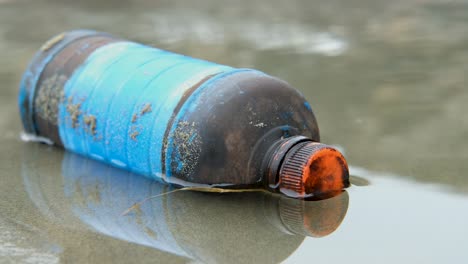 plastic bottle floating on water