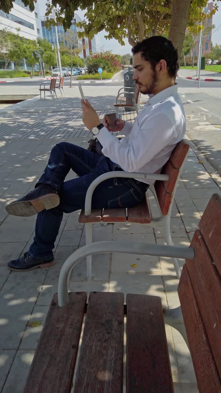 Urban Break, Businessman Using Tablet in Park