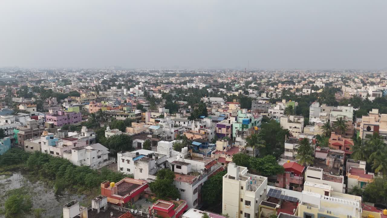 Cloudy morning shot of Bangalore city, emphasizing urban expansion and community living
