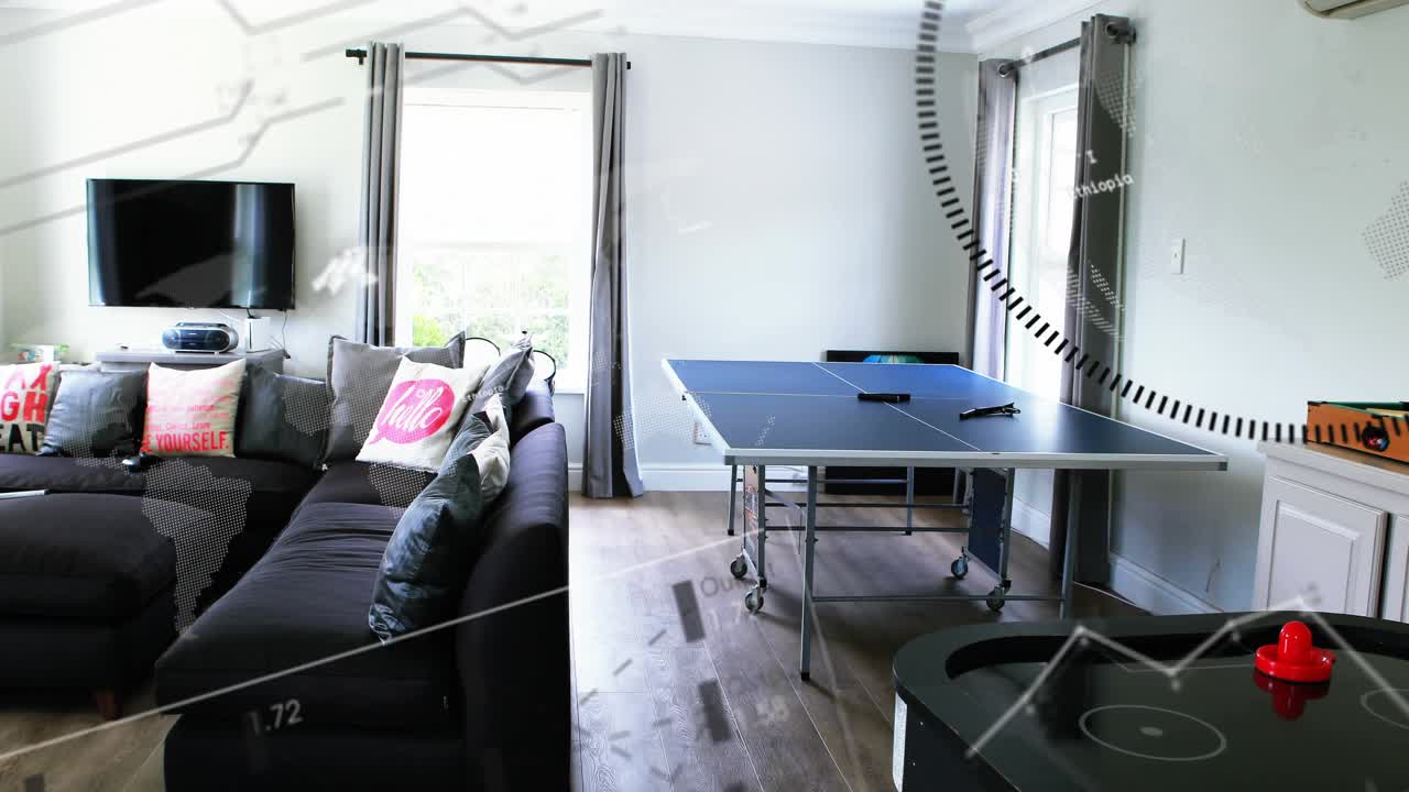 Starting camera panning and floating graphics revealing couch and gaming tables for recreation