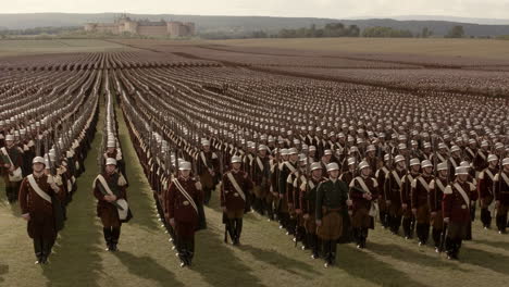 vast army formation in a field with a distant castle