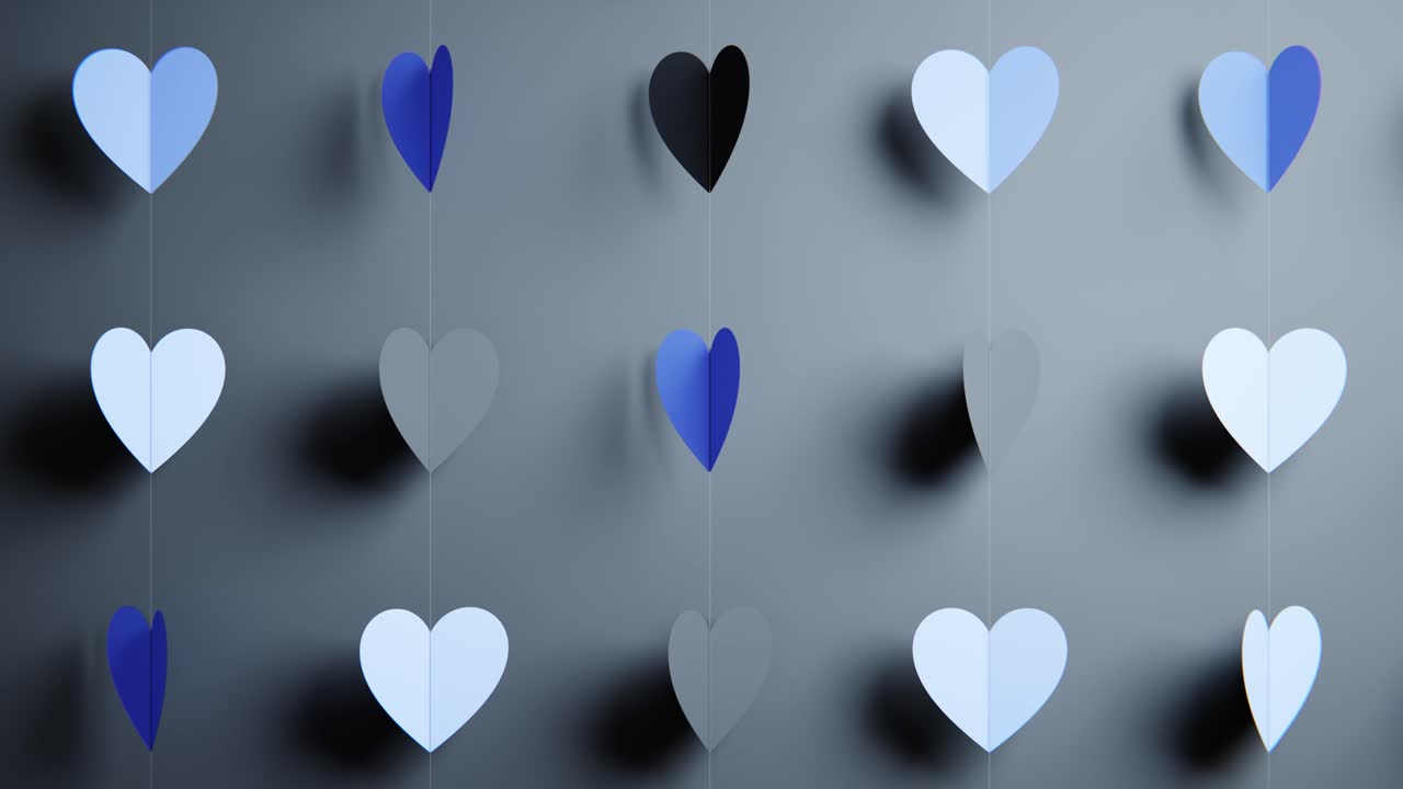 Loop continuo di cuori di carta blu e grigi rotanti