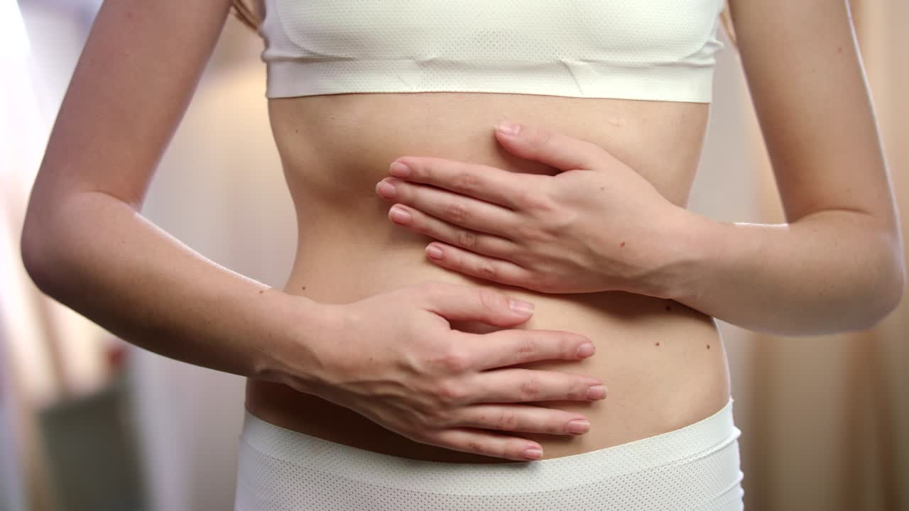 Woman body feeling abdominal pain. Menstruation pain. Illness spasm in body