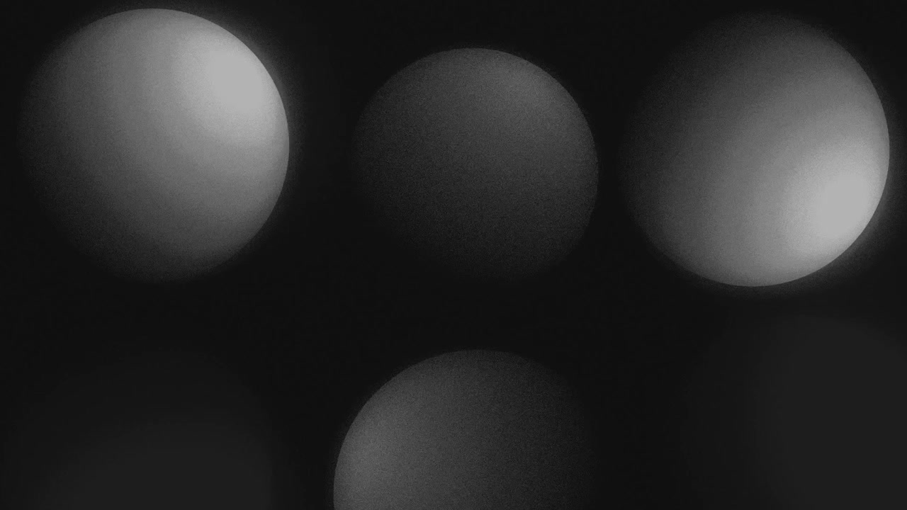 Animation of floating 3D sphere balls with shadows moving and wiggling through an abstract space on a dark gradient background dynamic motion graphics and visual effects vibrant colours grey white