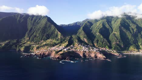 aerial mountain panorama of epic volcanic green coast in seixal, madeira