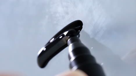 close-up of a black steam nozzle