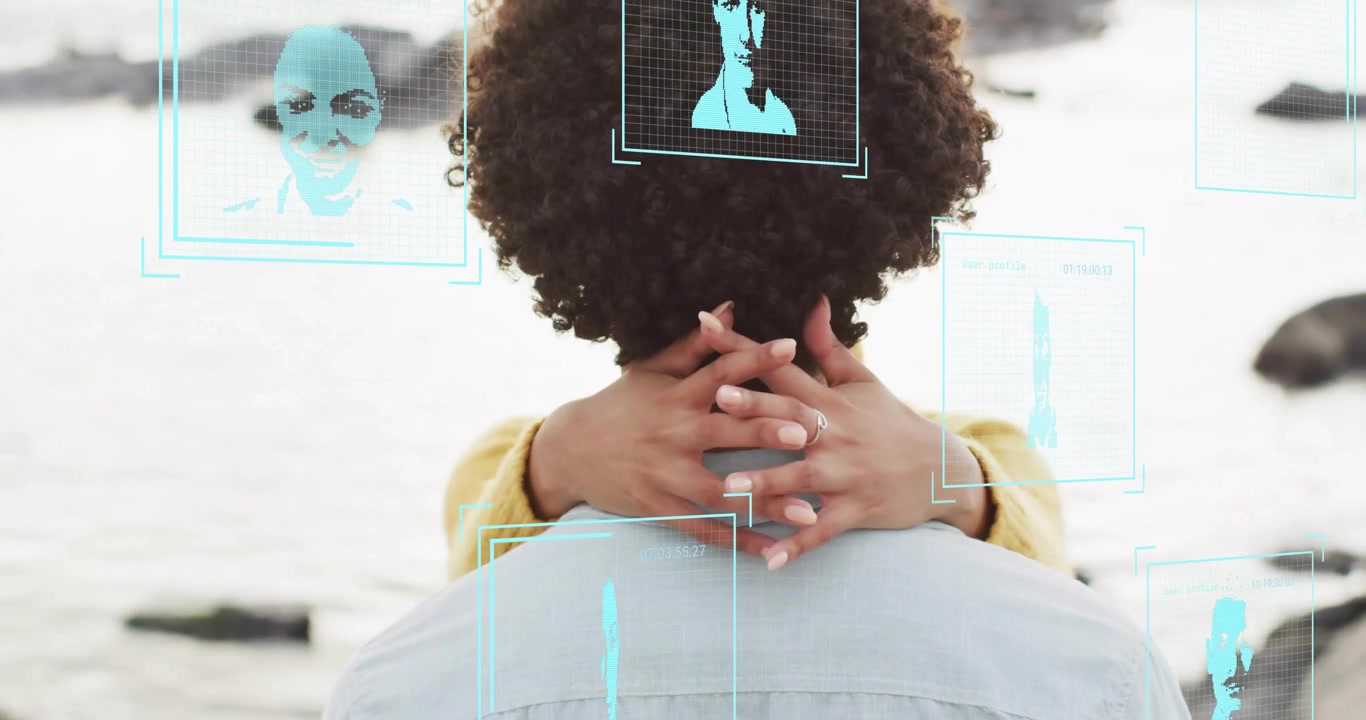 Couple Embracing on Beach with Digital Facial Recognition Overlay