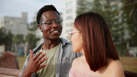 young adults talking in the park