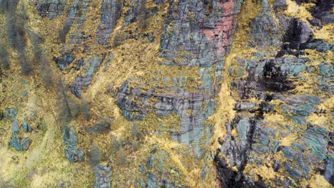 colorful rock strata with intricate patterns, nature's artistry on display, aerial view