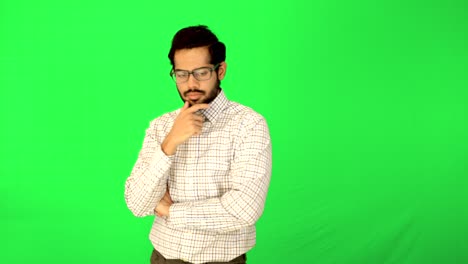 office-guy-standing-near-green-background---green-screen