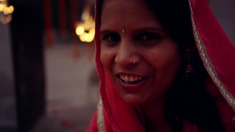 indian family decorating home for traditional diwali festivities