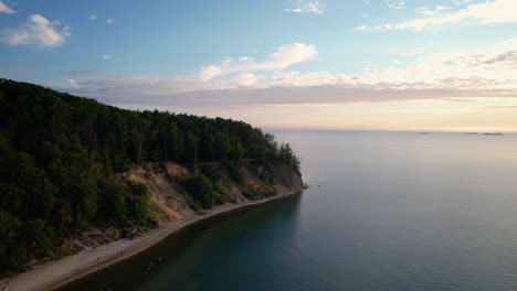 sunrise aerial riser view over scenic gdynia orlowo coastline, baltic sea