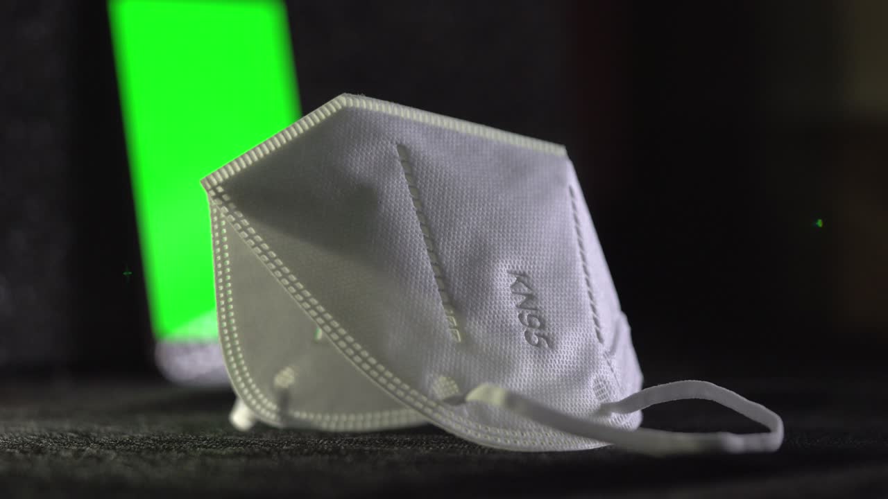 máscaras de protección médicas kn95, teléfonos inteligentes, pantalla lcd llave de croma