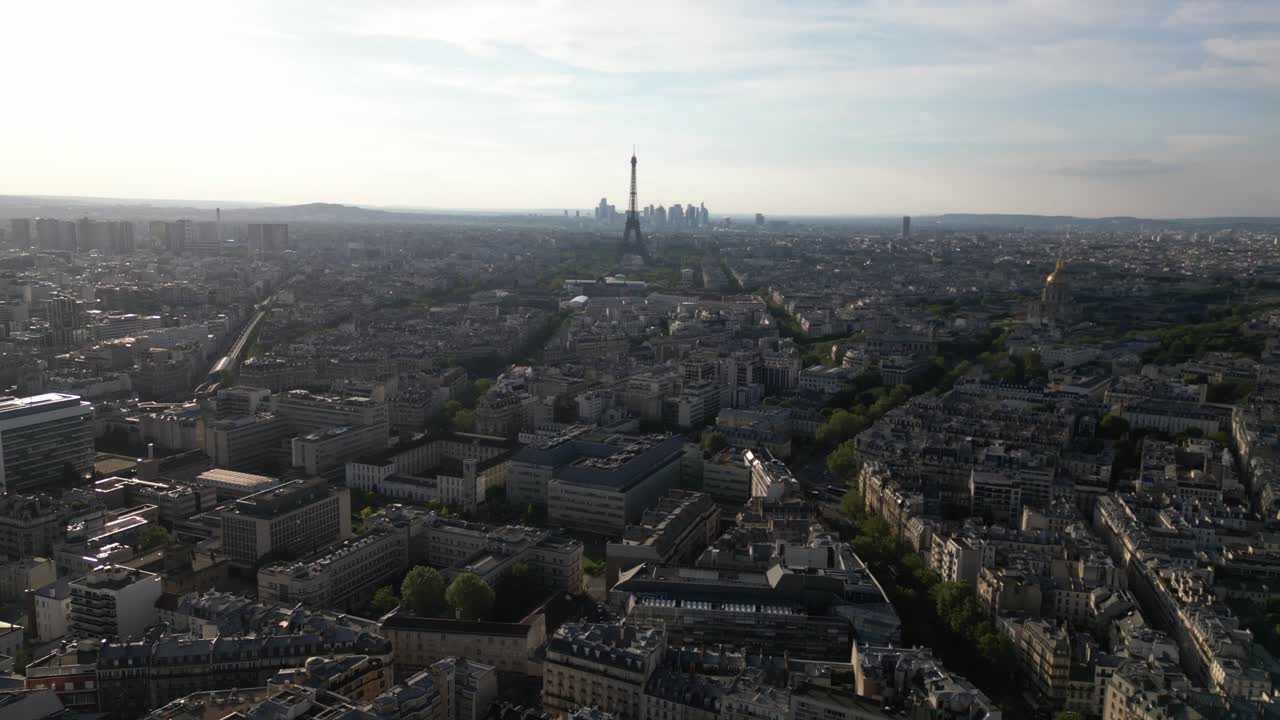Paris cityscape with Tour Eiffel and La Defense skyscrapers in background, France