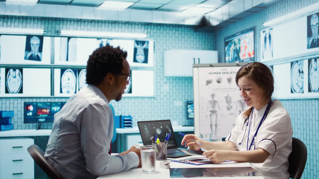 Doctor and patient interaction in a medical consultation room