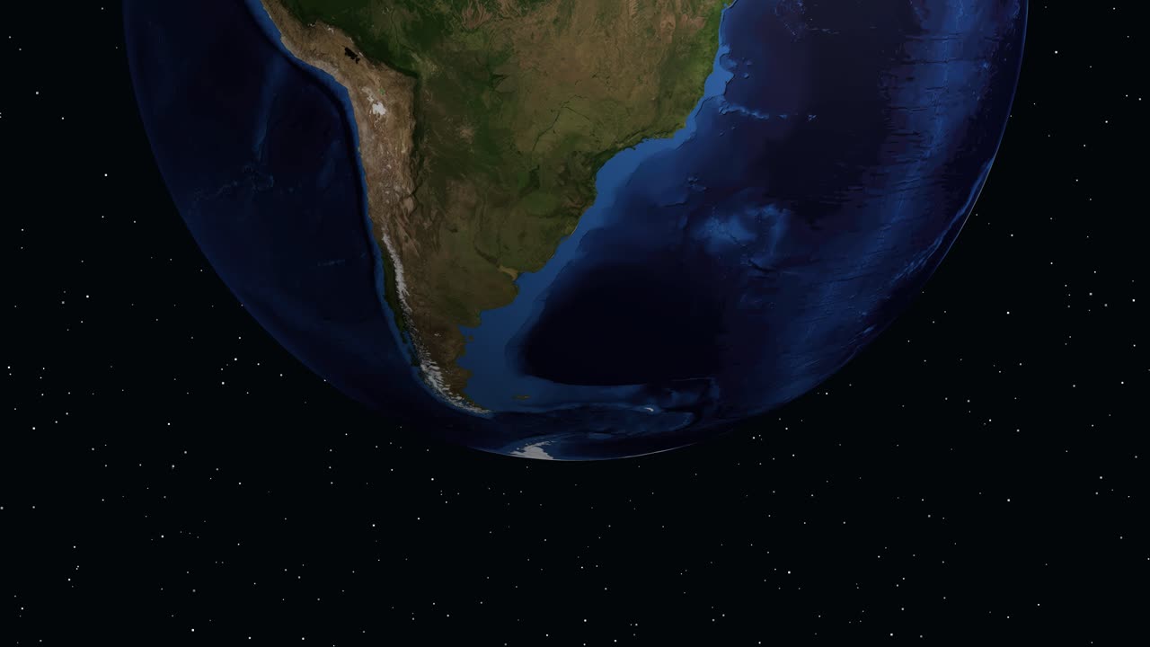 Digital globe rotates and zooms into South America, displaying demographic information for Punta Arenas
