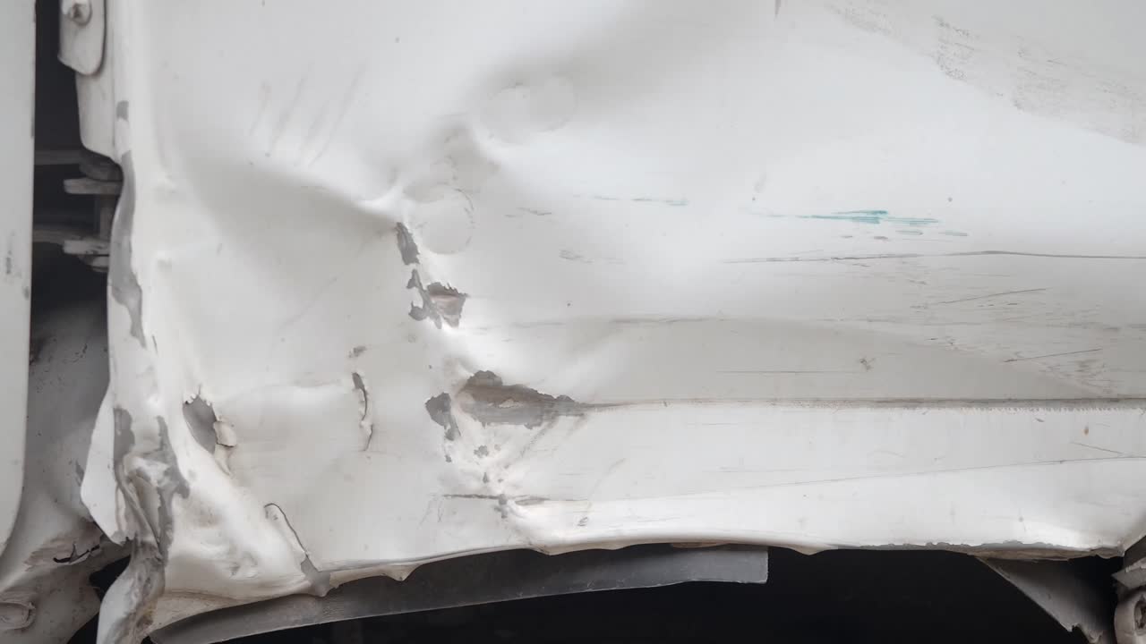 Damaged White Car Body