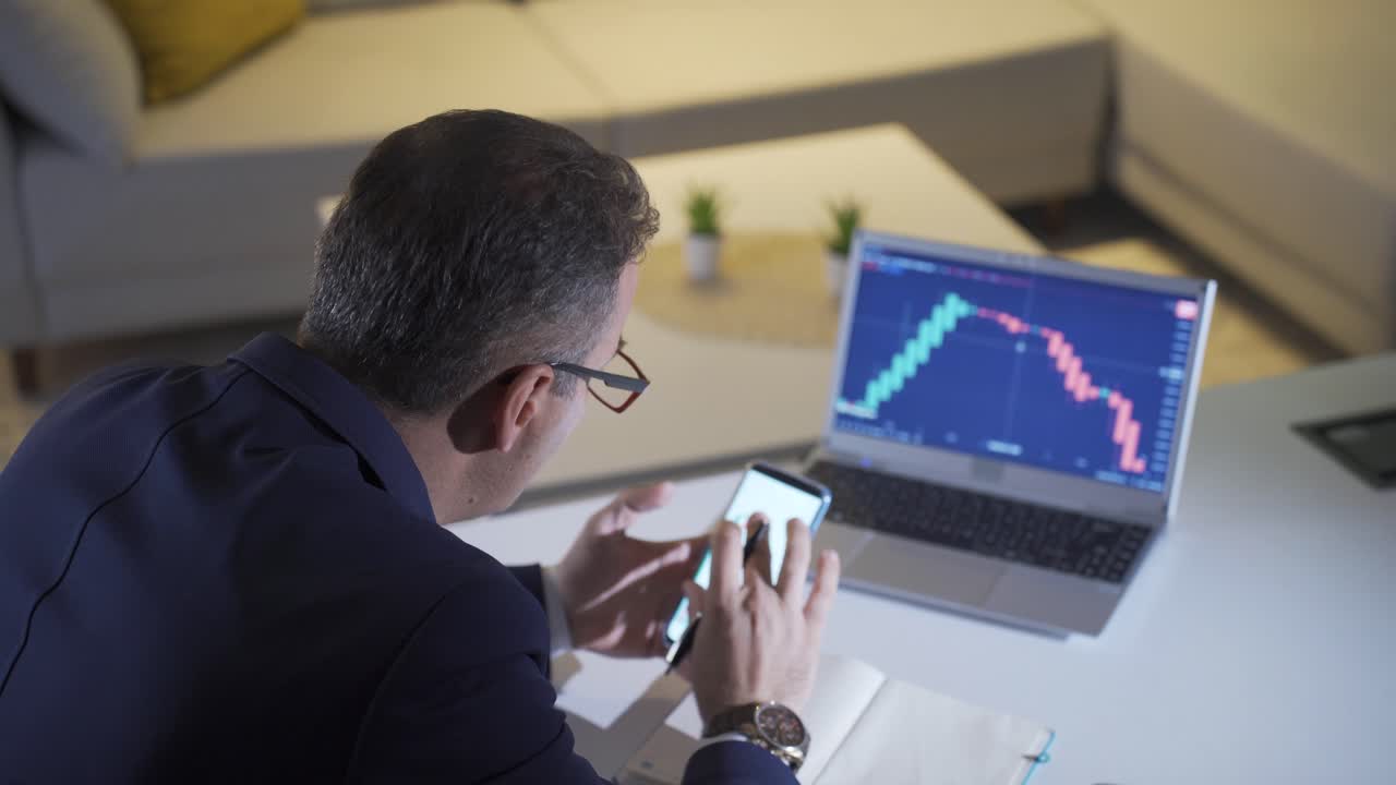 Stressed and angry stock trader losing.