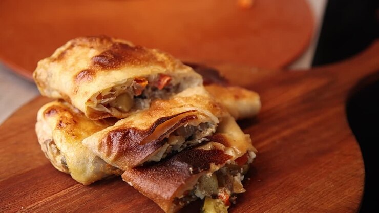 Golden Brown Savory Rolls with Vegetable and Meat Filling