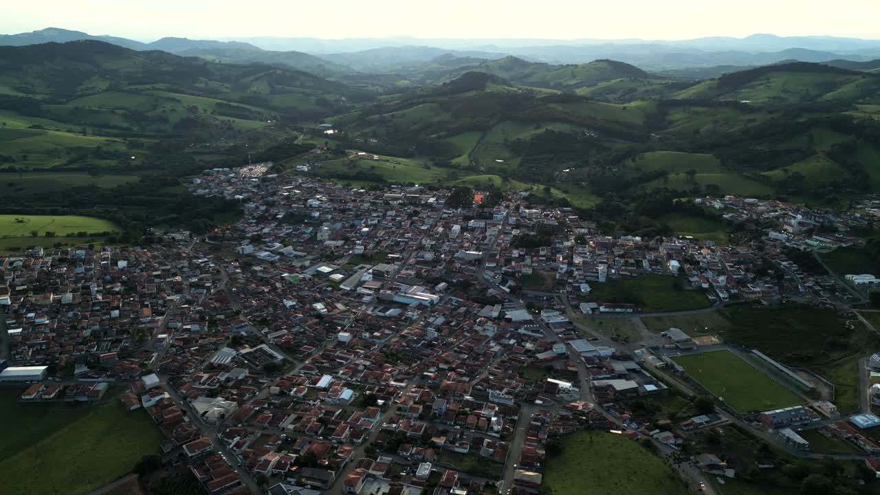 an aerial panoramic view of the municipality of Bueno Brandao south of Minas Gerais surrounded by the wide Mantiqueira mountain range - Brazil