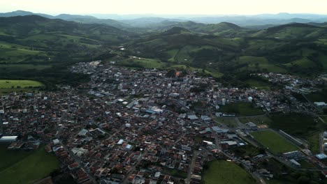 an aerial panoramic view of the municipality of bueno brandao south of minas gerais surrounded by the wide mantiqueira mountain range - brazil