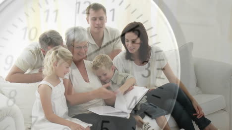 clock animation over multi-generational family reading book together on couch