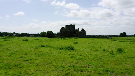 shot racing over vegetation towards an abandoned castle.