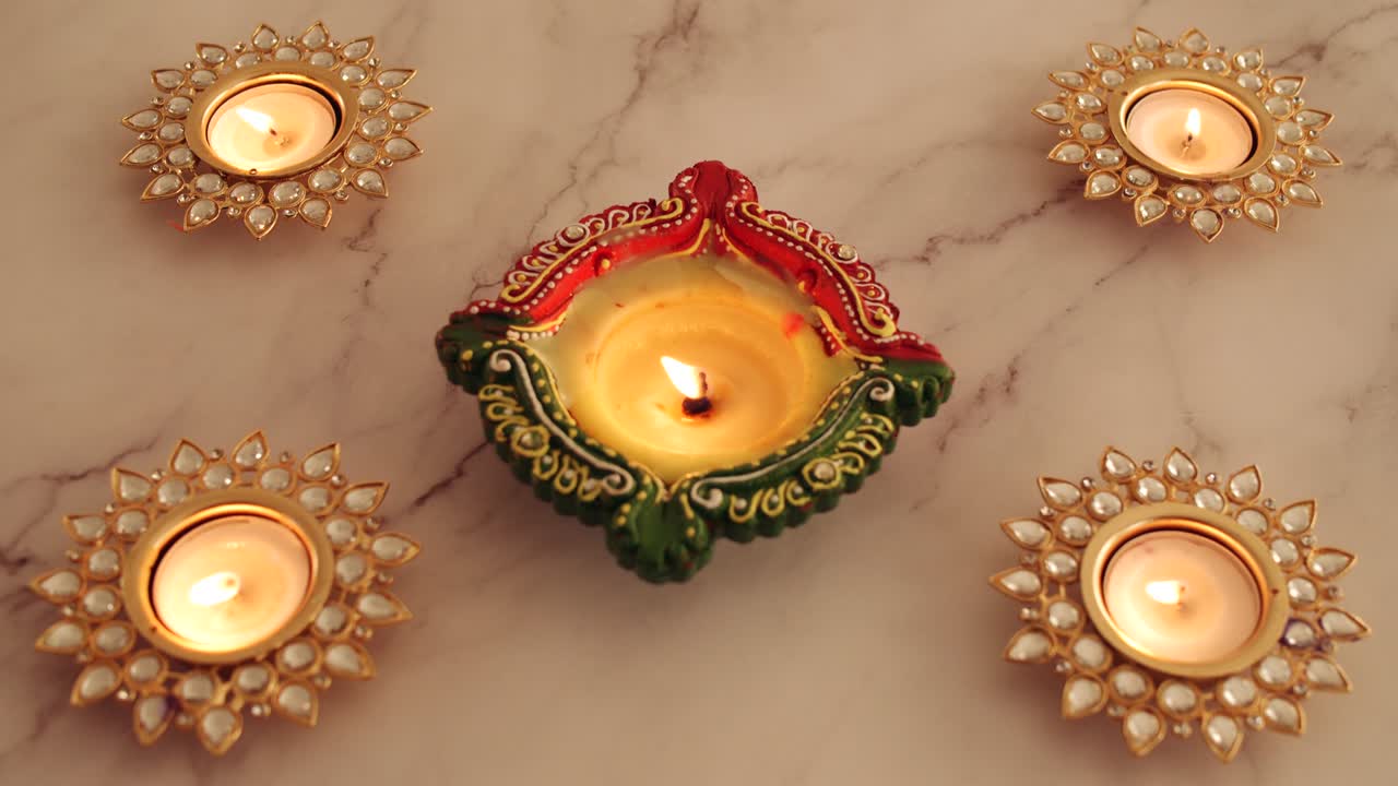 Diwali diyas being lit in 2020 in day time along with surgical masks
