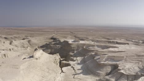 aerial view of a desert landscape with eroded formations